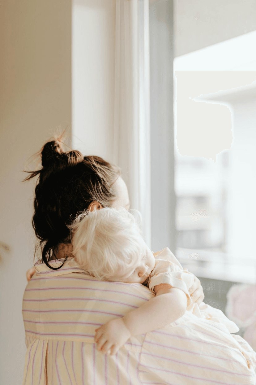 Baby sleeping on mother